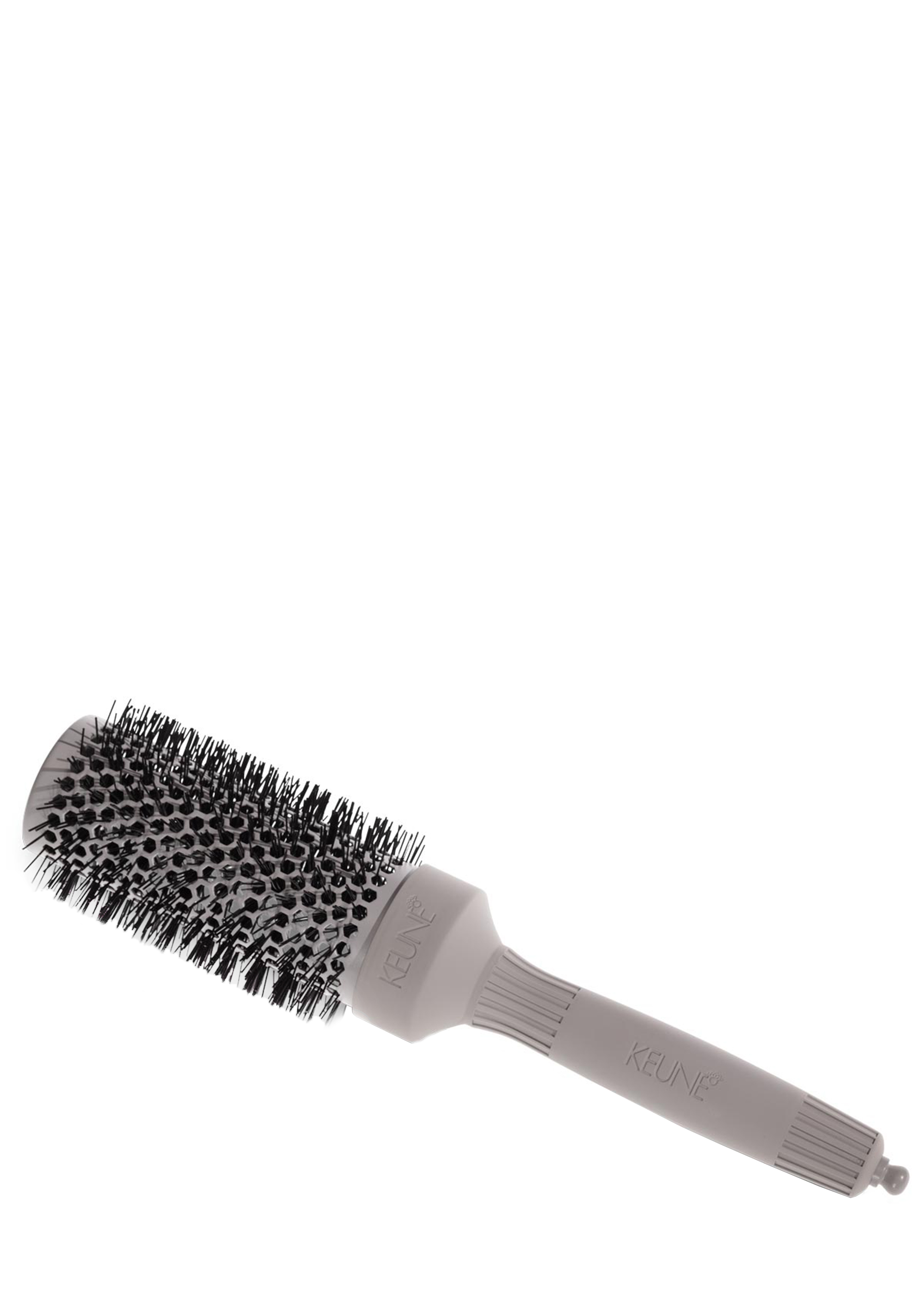 KEUNE CERAMIC ROUND BRUSH 42MM : La brosse professionnelle pour des cheveux pleins de vitalité, du volume et des boucles. Des outils de coiffure disponibles sur keune.ch.